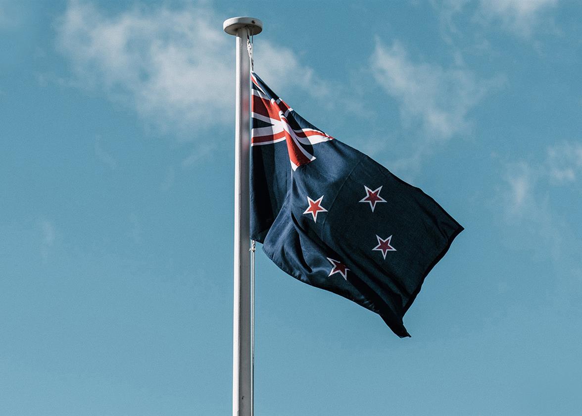 The flag of New Zealand waving in the wind.